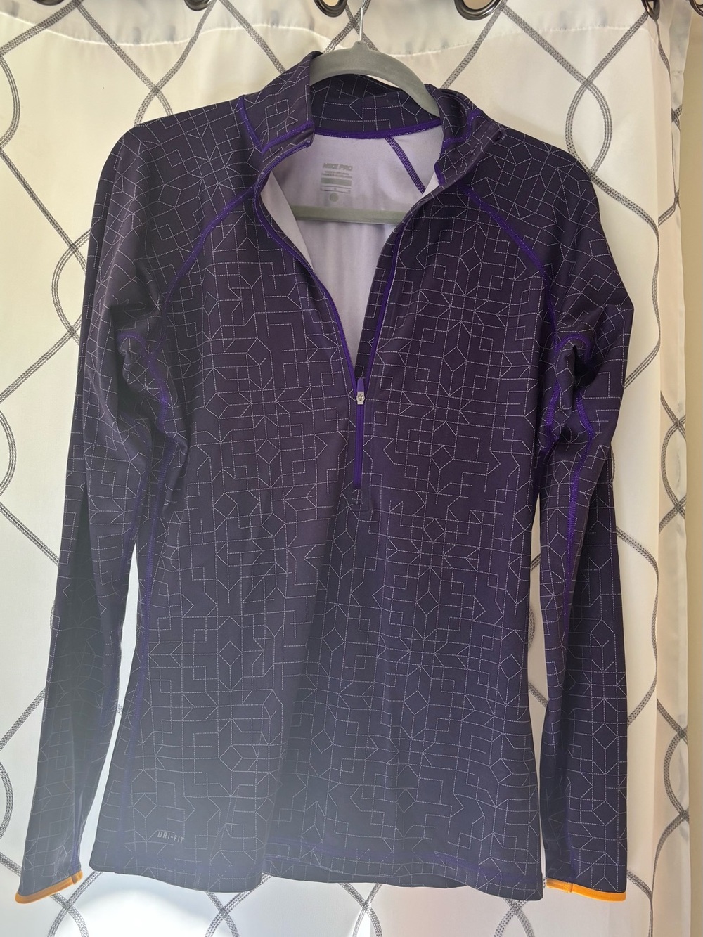 Nike Pro Purple Geometric Quarter-Zip pullover.